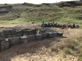 Schoolchildren learning about St Piran's Oratory on the Dynamic Dunescapes art workshop, Image by Perranporth Community Primary School