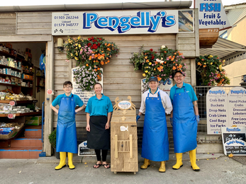 Staff from Pengelley's Fishmongers with their prototype crab line recycling station