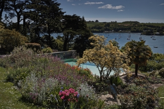 Gardens, swimming pool and the river at Pedn Billy