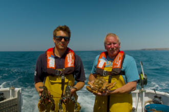 Fisherman with Lobsters and Spider Crab