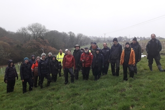 Volunteers and staff from Cornwall Wildlife Trust's Upstream Thinking team and South West Lakes after a hard day of tree planting