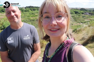 Vlogger Emmeline Hardisty and Andy Nelson from Cornwall Wildlife Trust's Dynamic Dunescapes project on a nature trail at Upton Towans