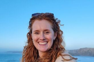 Image of a person by the coast