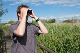 Man with binoculars