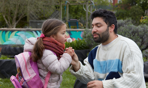 Nextdoor Nature Father Daughter Blowing Dandelion