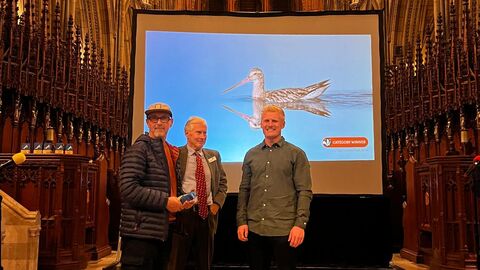 Mark James collects his award from South West Optics, for his feathered friends image which is shown in the background. 