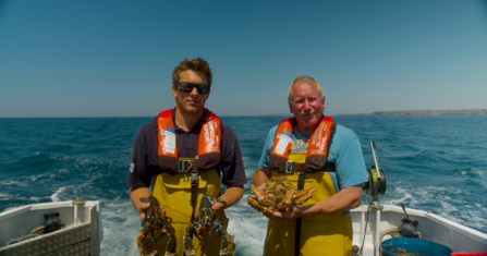 Fisherman with Lobsters and Spider Crab