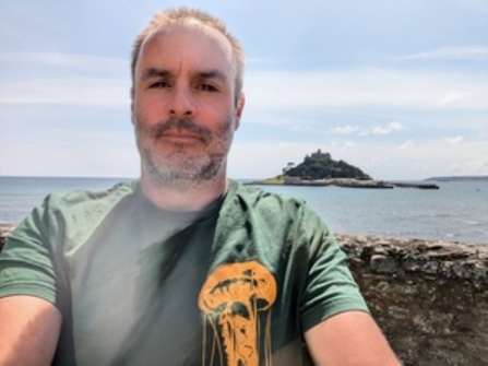 Image of a person by the coast