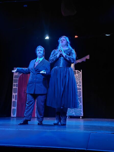 two performers on the stage during the Choughs panto performance. 