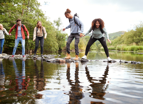 Friends on a walk - Shutterstock