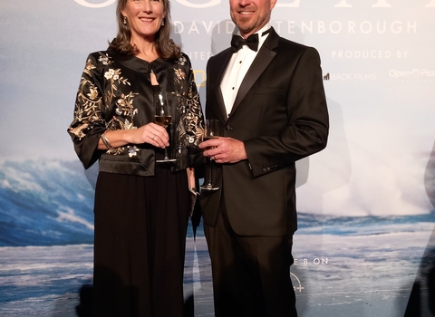 Ruth Williams, The Wildlife Trusts' head of marine conservation stood in front of the Ocean film poster with Matt Walpole, Chief Executive of Cornwall Wildlife Trust