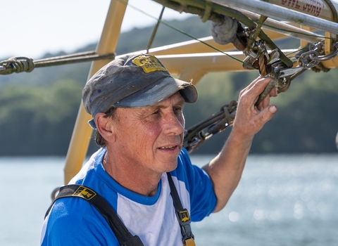 a fisherman on his boat 